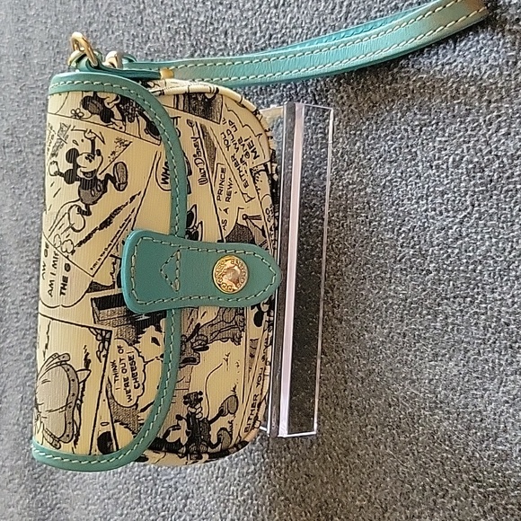 Dooney & Bourke Handbags - Dooney & Bourke Disney collab very rare wristlet, black & white newspaper print
